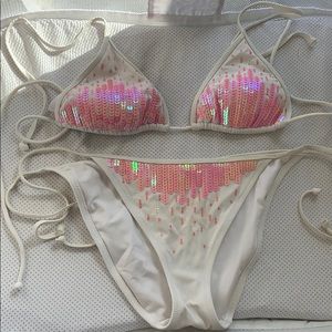 Victoria’s Secret pink sequence and white bikini